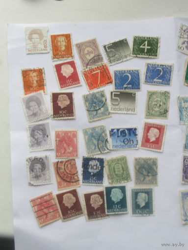 Три кучки почтовых марок Германия и Голландия