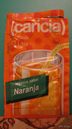 Этикетка от растворимого напитка Caricia (апельсиновый).