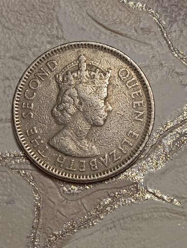 Карибы 25 центов 1965 года .