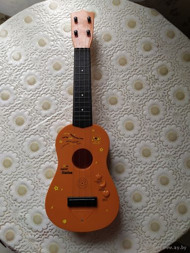 Детская музыкальная игрушка - гитара