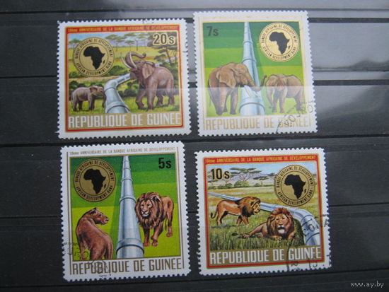 Марки - фауна, Гвинея, слон, лев - дикие кошки