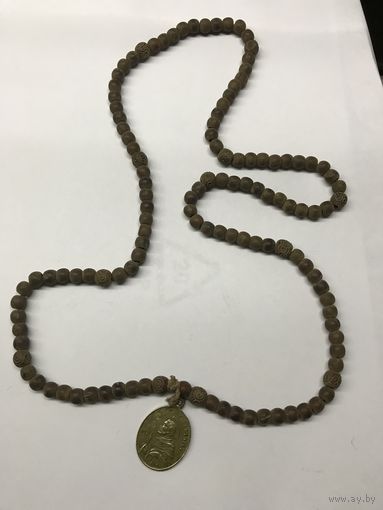 Старинный ружанец-четки с медальоном святого Доминика.